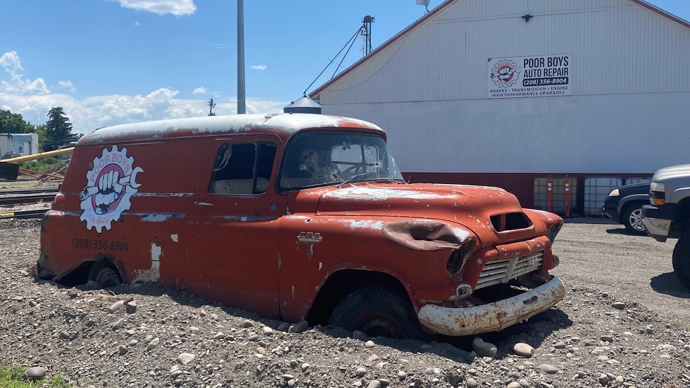 Poor Boys Auto Repair shop with vintage delivery van out front